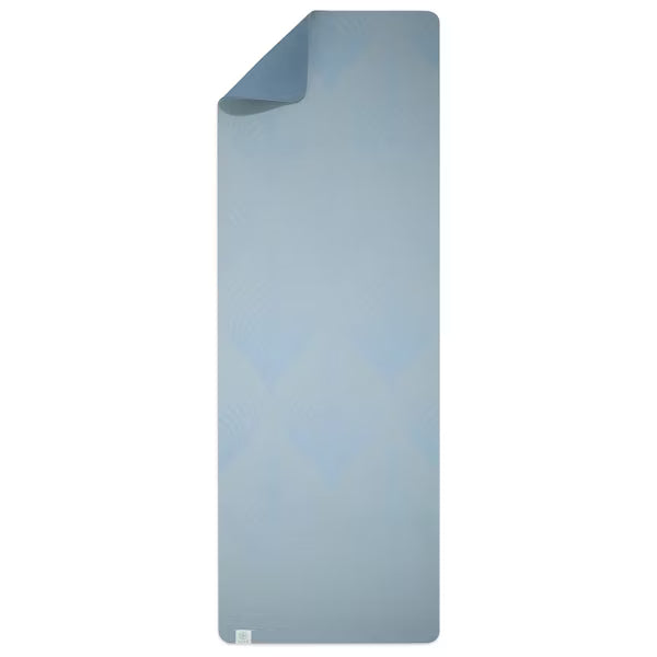 Gaiam Studio Flow blue yoga mat with dual non-slip reversible TPE surface