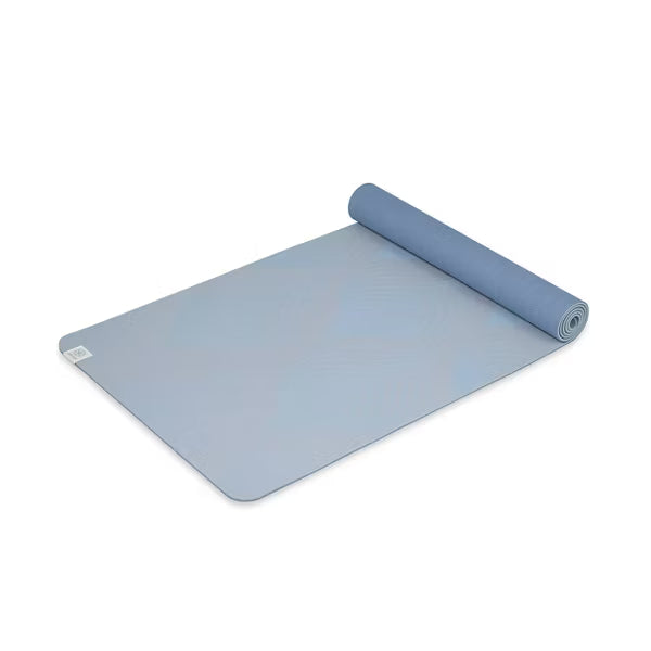Gaiam Studio Flow blue yoga mat with dual non-slip reversible TPE surface