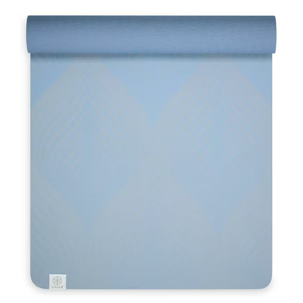 Gaiam Studio Flow blue yoga mat with dual non-slip reversible TPE surface
