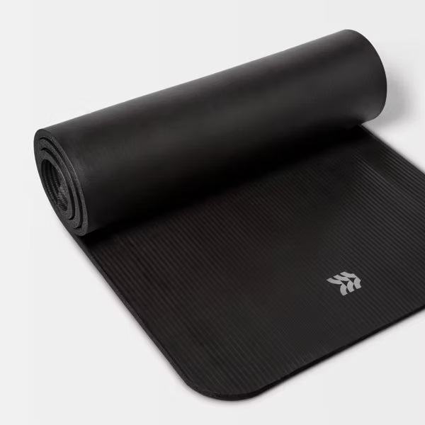 Premium 15mm black fitness yoga mat with non-slip texture and carrying strap
