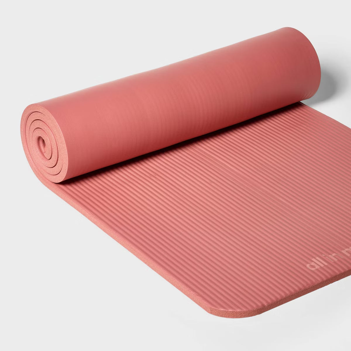 Premium 15mm orange fitness yoga mat with non-slip texture and carrying strap