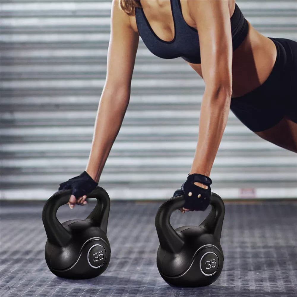 35lb HDPE coated black kettlebell with flat base and wide ergonomic grip for home gym