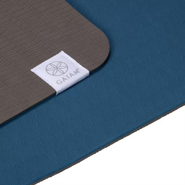 Gaiam Studio Flow green yoga mat with dual non-slip reversible TPE surface